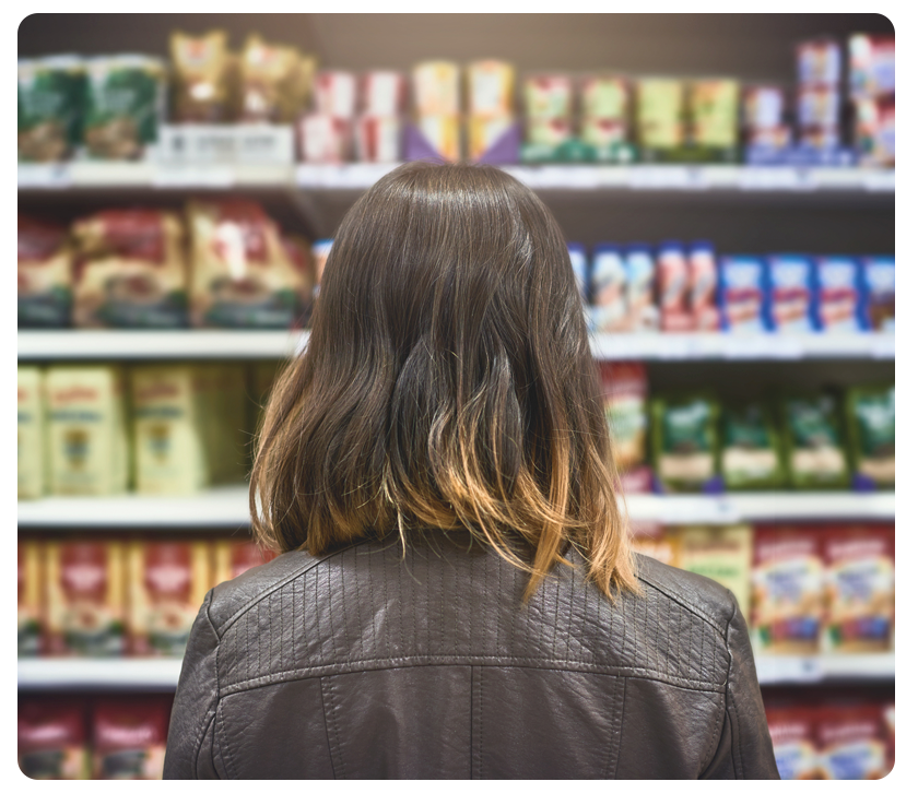 shopper in grocery aisle